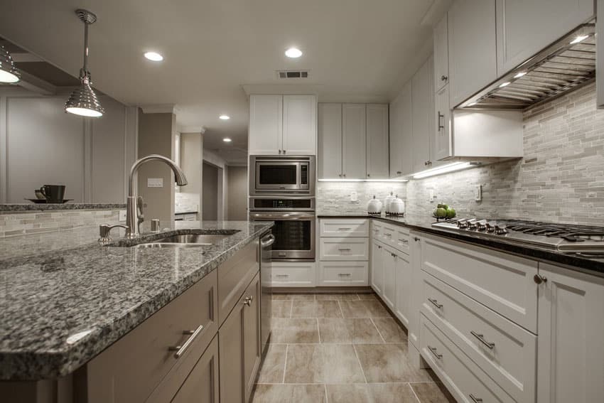 Luxury kitchen with a contemporary style and brown island with white base cabinets