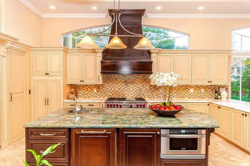 Luxury kitchen with island and gemstone countertops