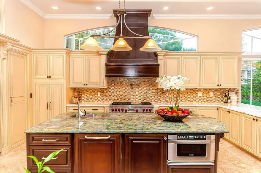 Kitchen with island and gemstone countertops