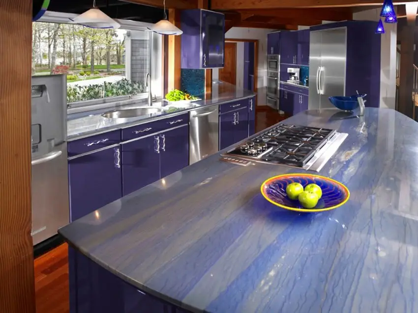Modern purple galley kitchen with purple lights and counter