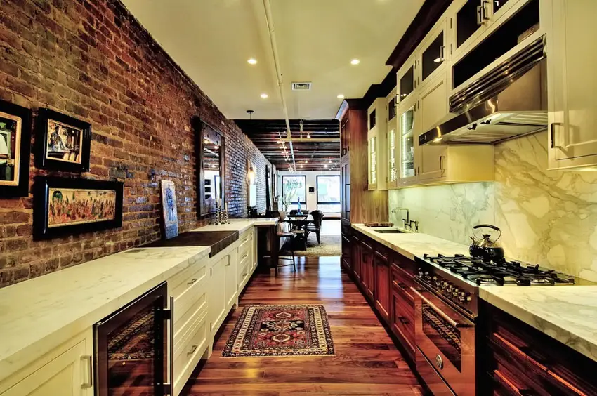 Rustic galley kitchen with brick accent wall