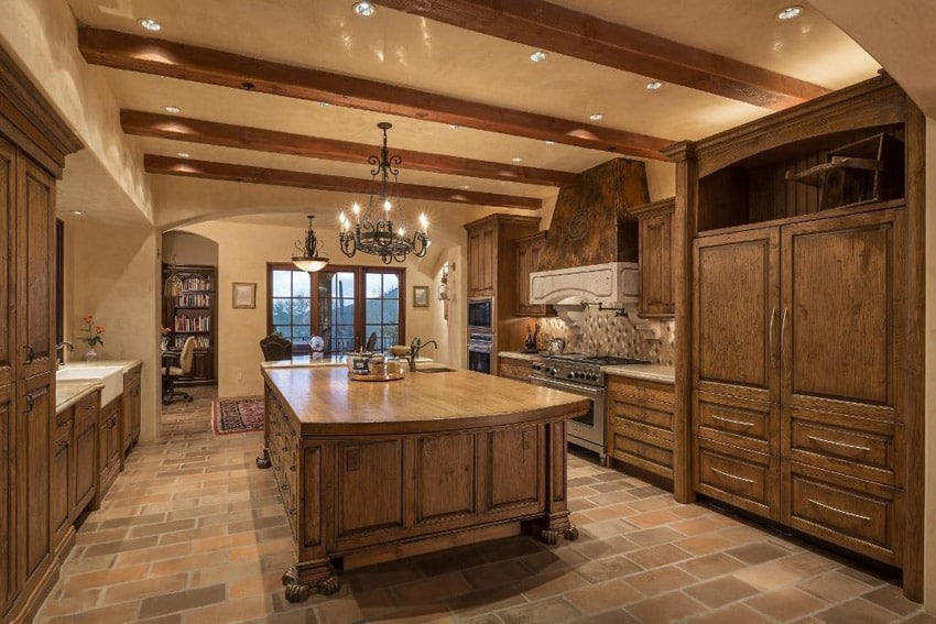 Rustic luxury kitchen with island and chandelier
