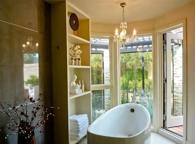 Spa like bathroom with garden view