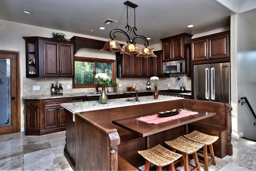 Kitchen with walnut cabinets with kitchen nook