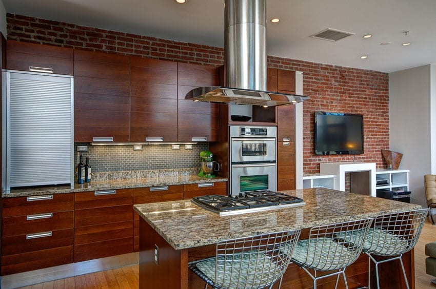 Contemporary kitchen with brick accent wall