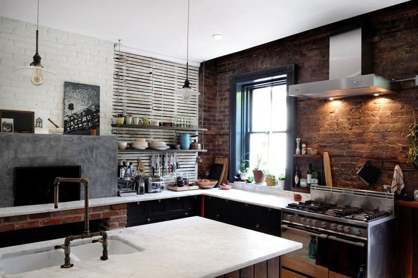 Contemporary kitchen with rustic brick wall and bianco bello marble countertops