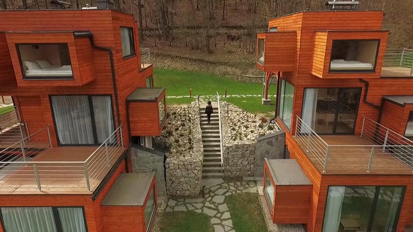 View of modern micro apartments with natural wood exterior