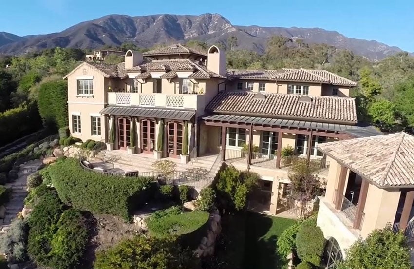 Front of Italian style luxury home with ocean and mountain view