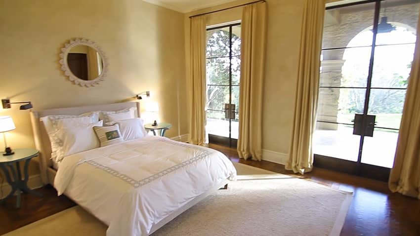 Guest bedroom with two glass doors