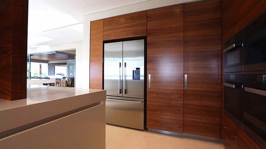 Inside modern kitchen with flush cabinets