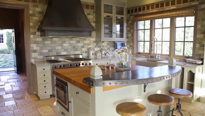 Italian style kitchen with breakfast bar and butcher block island