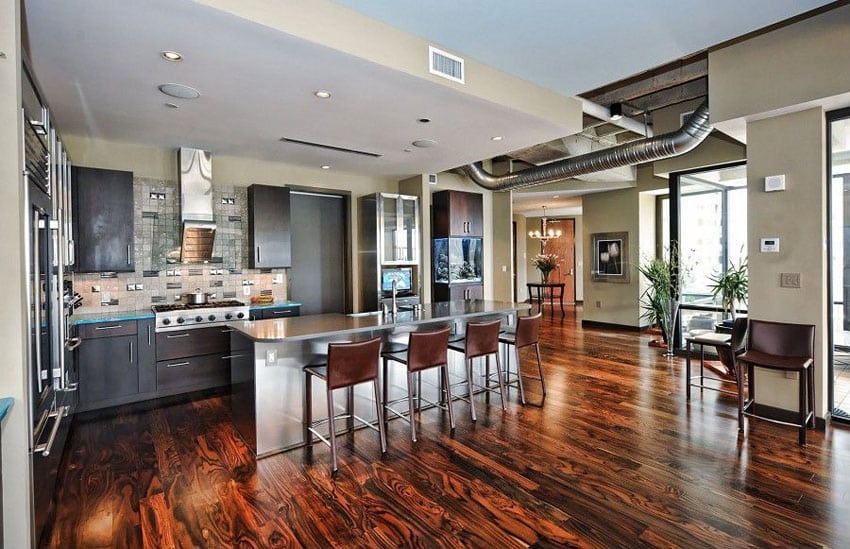 Kitchen in industrial style room with engineered hardwood floor