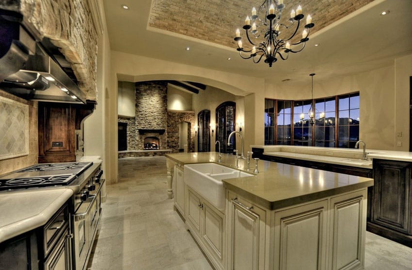 Kitchen with quartz counter and chandelier