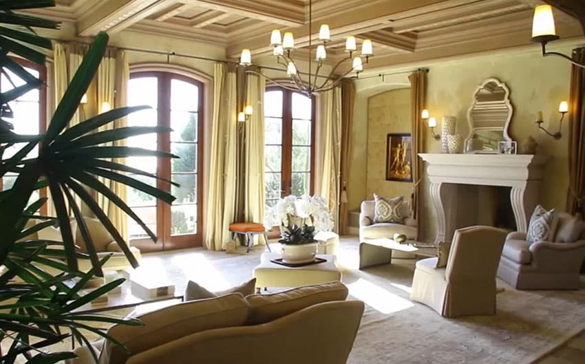 Luxury living room with coffered ceiling and fireplace