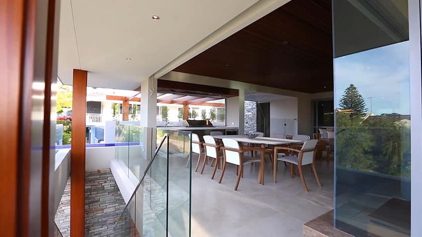 Modern patio area with glass walls
