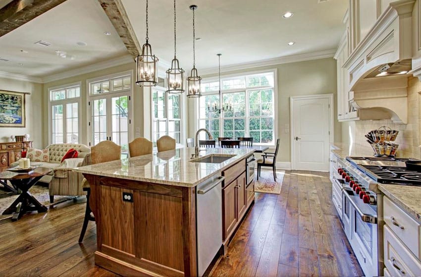 Open concept kitchen with golden crystal granite counter