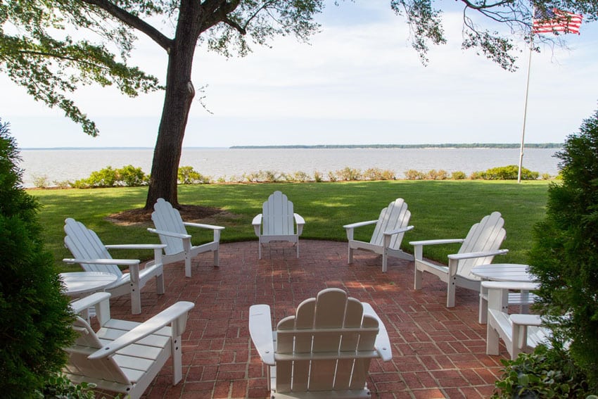 Rounded brick patio with lake view