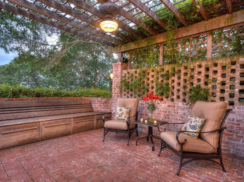 rustic brick patio with wood pergola