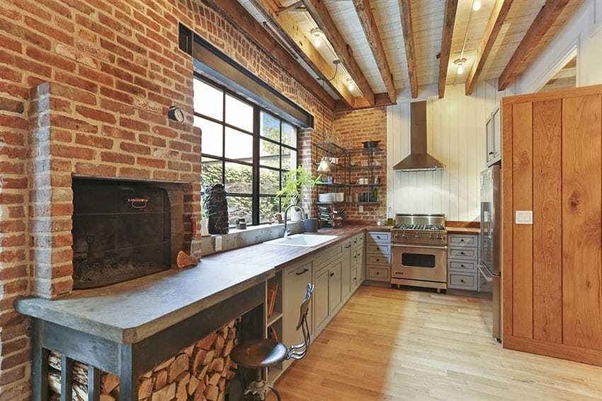 Rustic kitchen with brick fireplace wood countertops