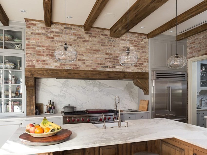 Rustic kitchen with reclaimed brick and exposed beam ceiling