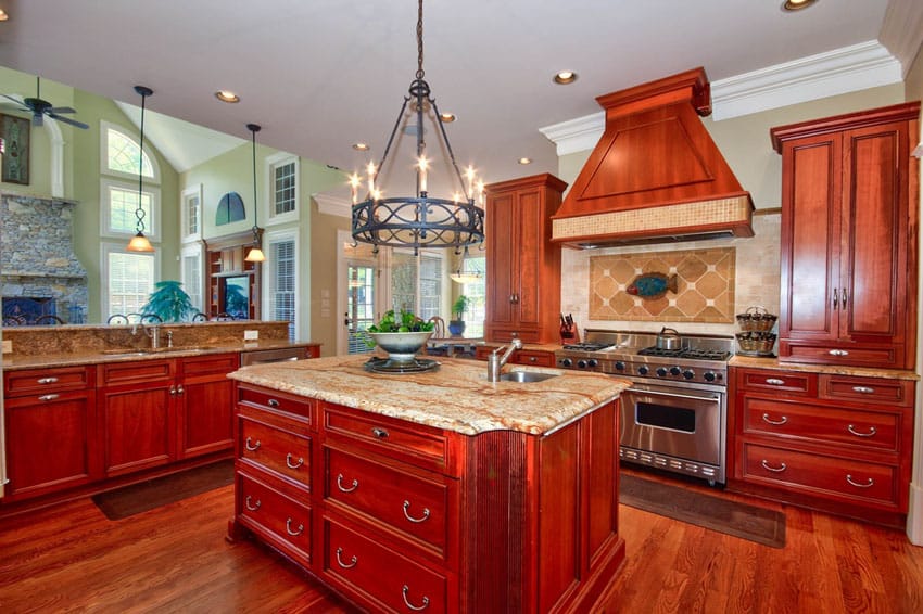 Kitchen with all wood look, panel wood cabinets and cream tile backsplash