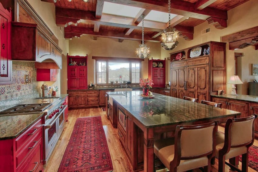 U shaped kitchen with raised coffered ceiling and cream stools