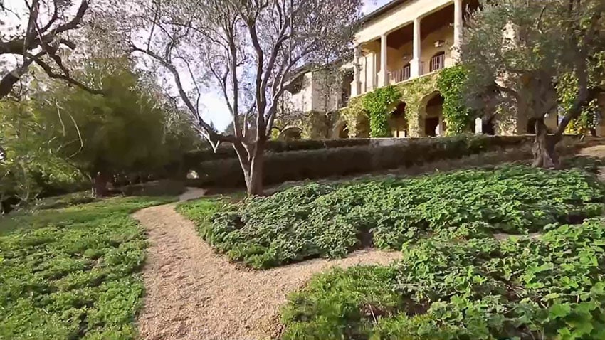 Walkway in yard of luxury home