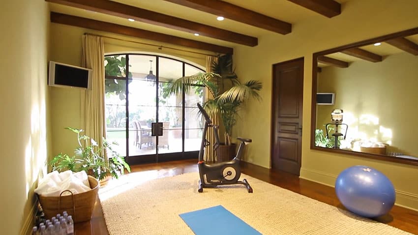Workout room in luxury home with outdoor view