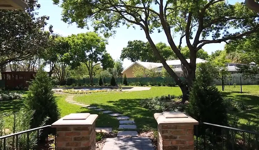 Backyard stepping stone path to swimming pool