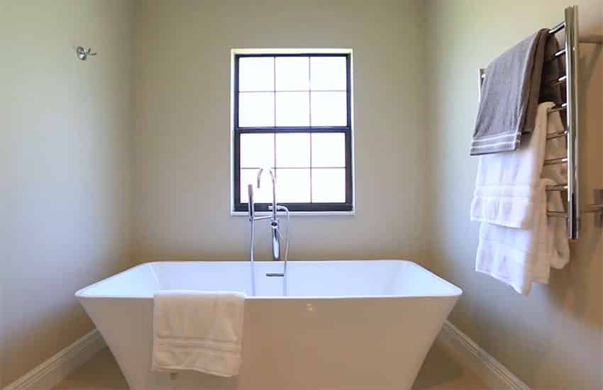 Bathroom with contemporary bathtub and window