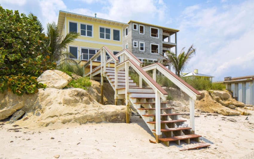 Beach home design with stairs to ocean