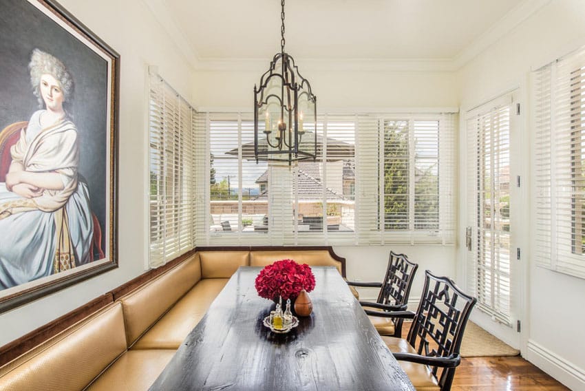 Traditional dining nook with bench and wood table