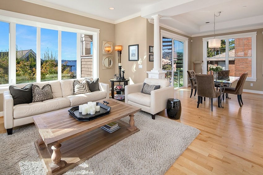 bright living room with water views and wood flooring