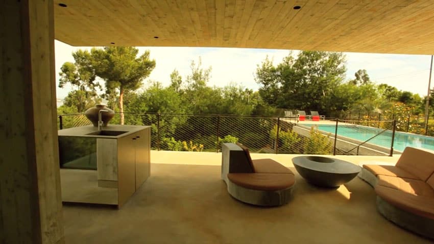 Concrete pool patio at modern house