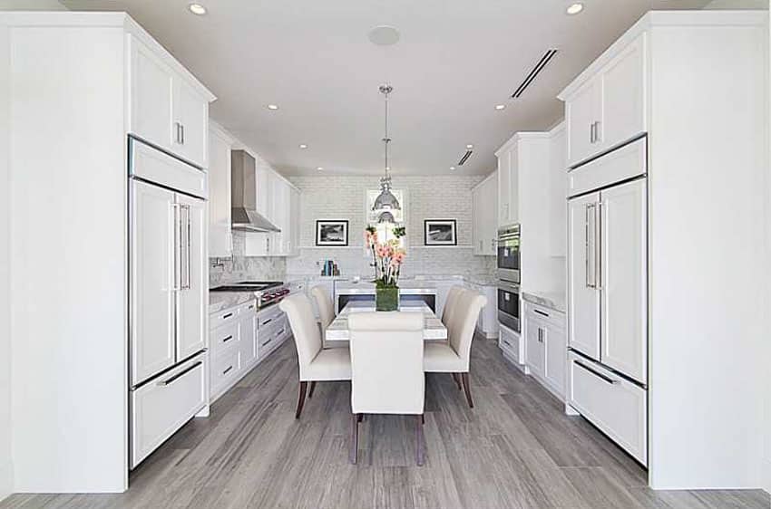 Contemporary kitchen with white flat panel cabinets
