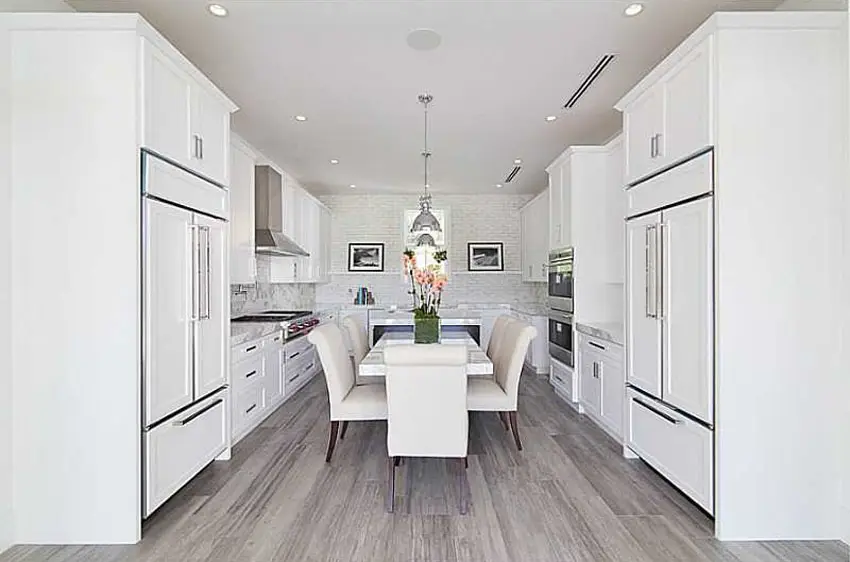 Kitchen with white flat panel cabinets