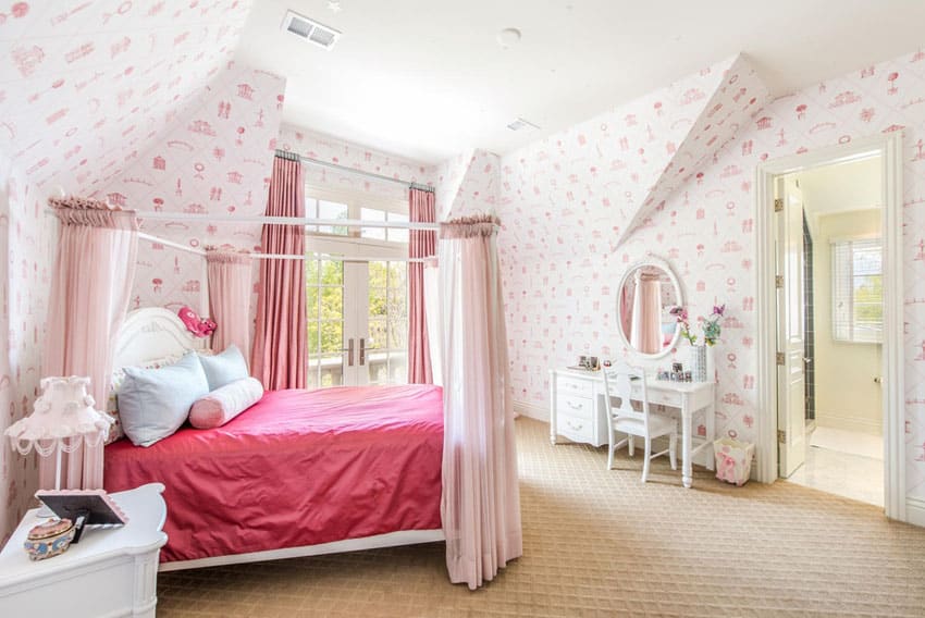 Girls bedroom with princess bed pink wallpaper