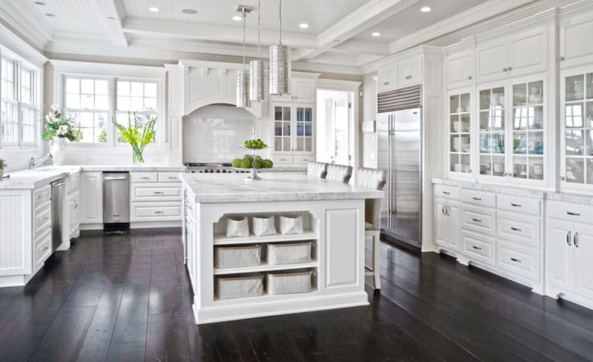 Gorgeous white cabinet kitchen with marble counters and dark chocolate oak floors