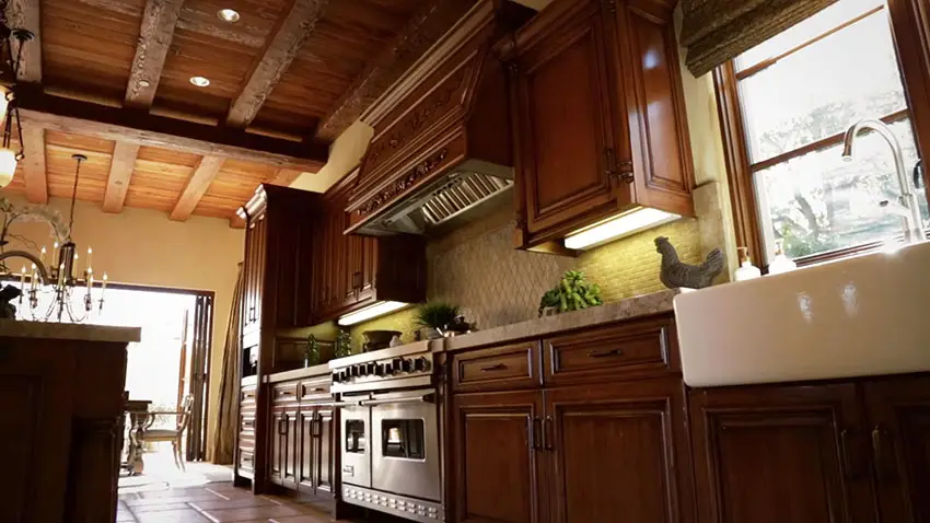 Italian style kitchen with farmhouse sink wood ceiling