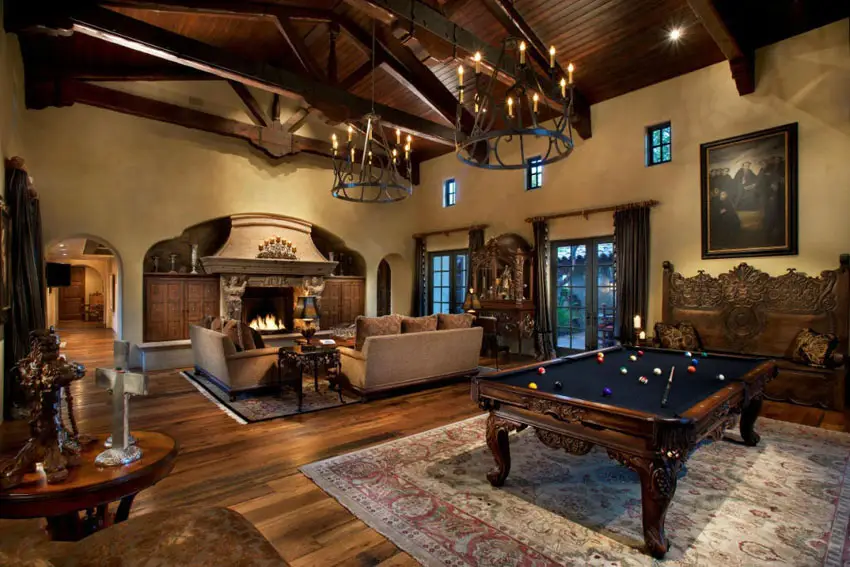 Room with open layout with pool table and Baroque style furniture