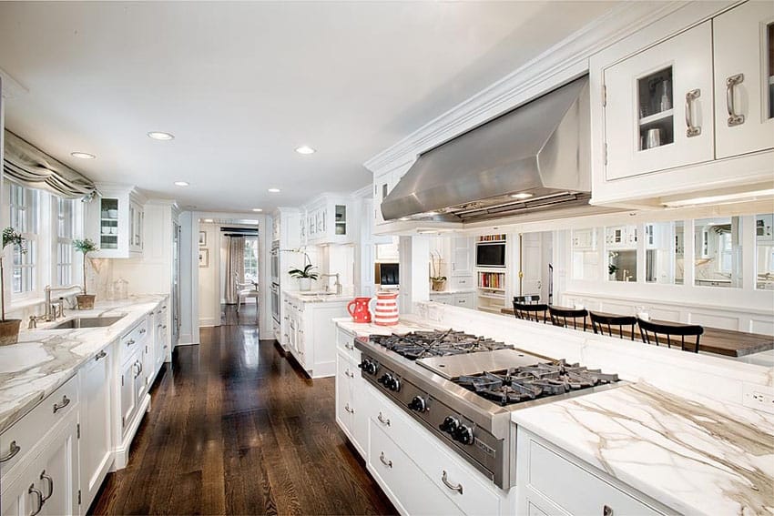 Kitchen with cabinets marble countertop and mocha oak hardwood floors