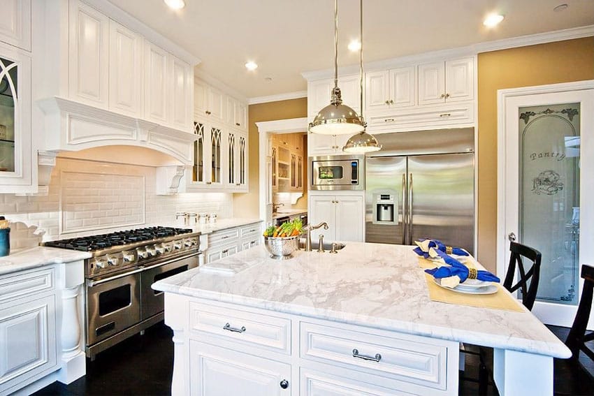 Luxury white cabinet kitchen with marble countertops