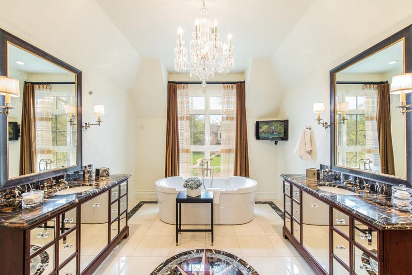 Master bathroom at French provincial house with chandelier