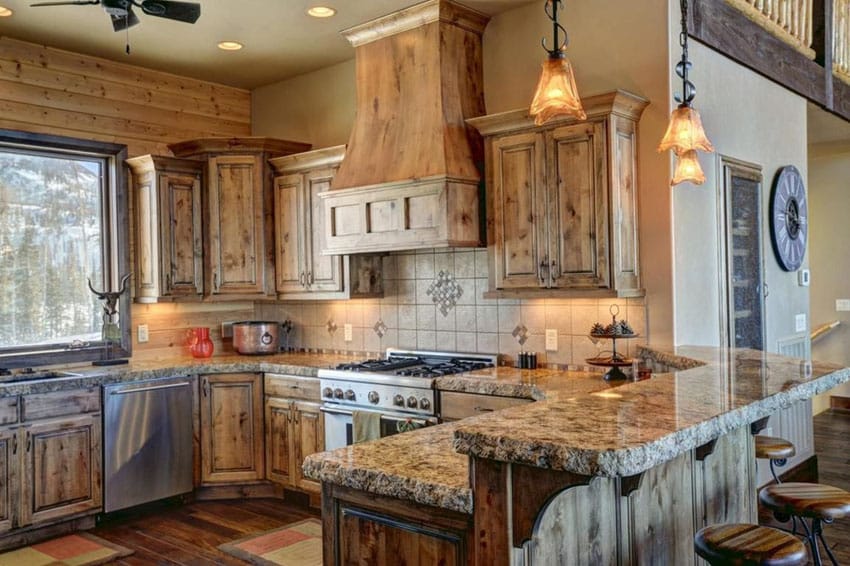 Kitchen with knotty pine cabinets and gray wall clock