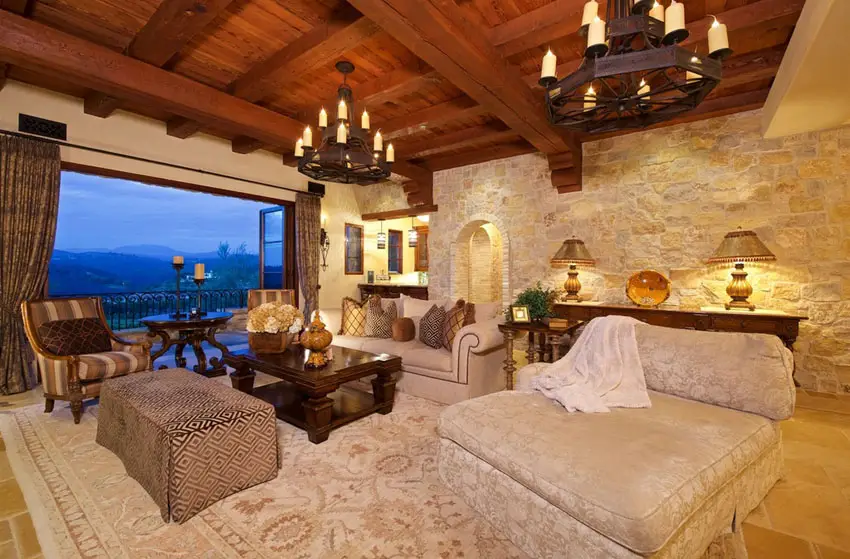 Rustic living room with stone wall and luxury furnishings