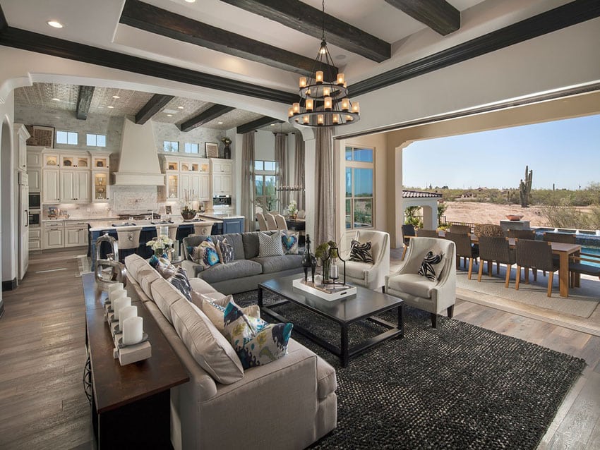 Open space layout with exposed beam ceiling, console table and cabinets 