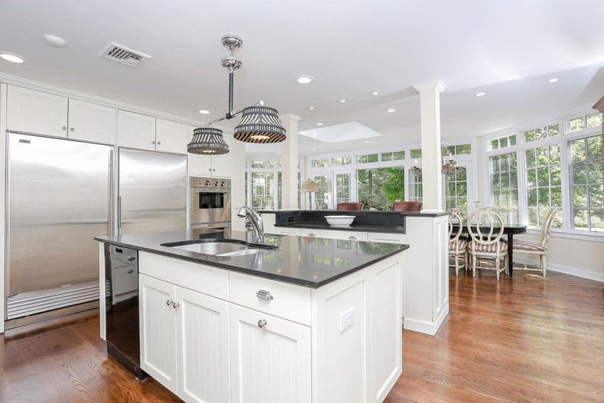 Kitchen with absolute black granite countertops and cabinets