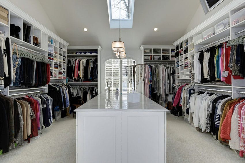 Closet with open shelving and hanging racks