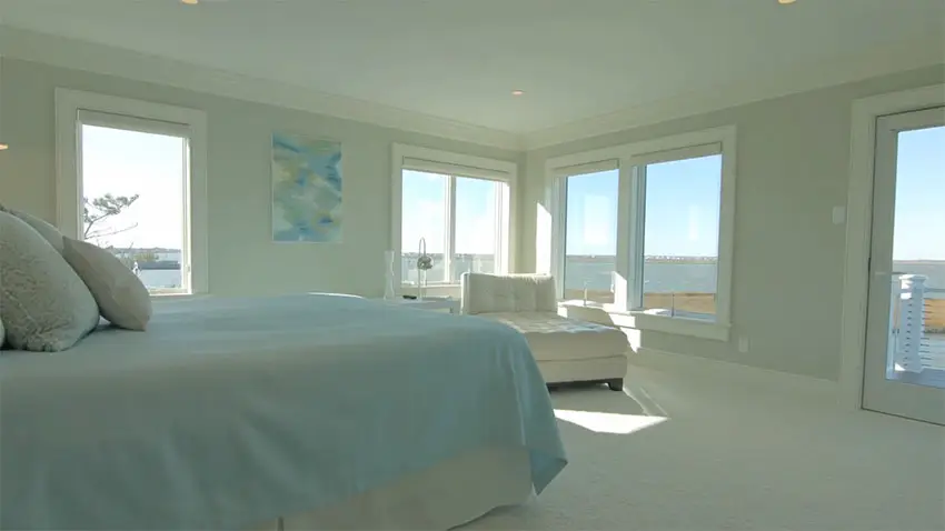 Bright bedroom with waterfront estuary views