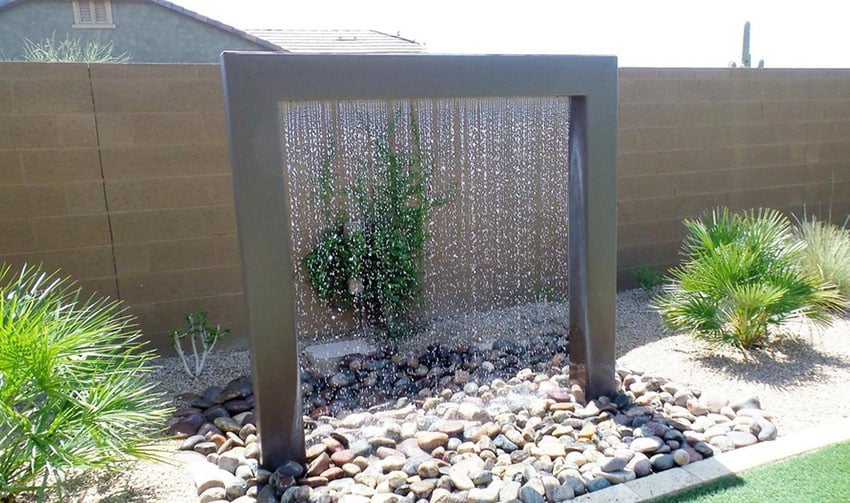 Contemporary waterfall rain shower in backyard